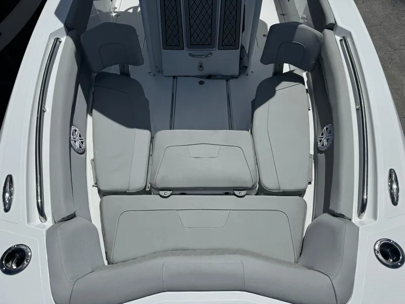 Slide: The Image of 2024 Wellcraft 262 Fisherman boat interior with cushioned seating and modern design. - 20