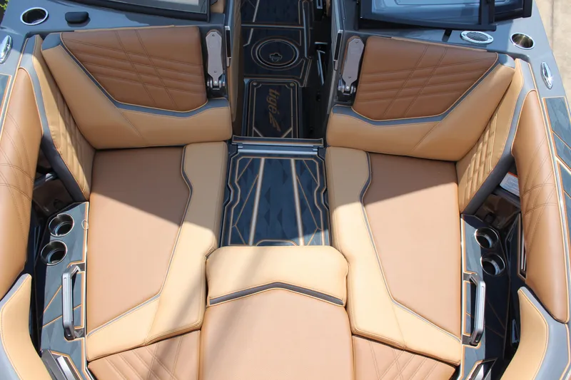Slide: The Image of Luxurious interior of 2025 Tigé Ultré 23ZX boat with tan leather seating. - 16