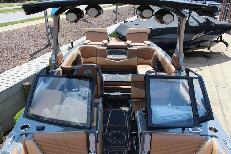 Slide: The Image of 2025 Tigé Ultré 23ZX boat interior with luxurious seating and modern design. - 17