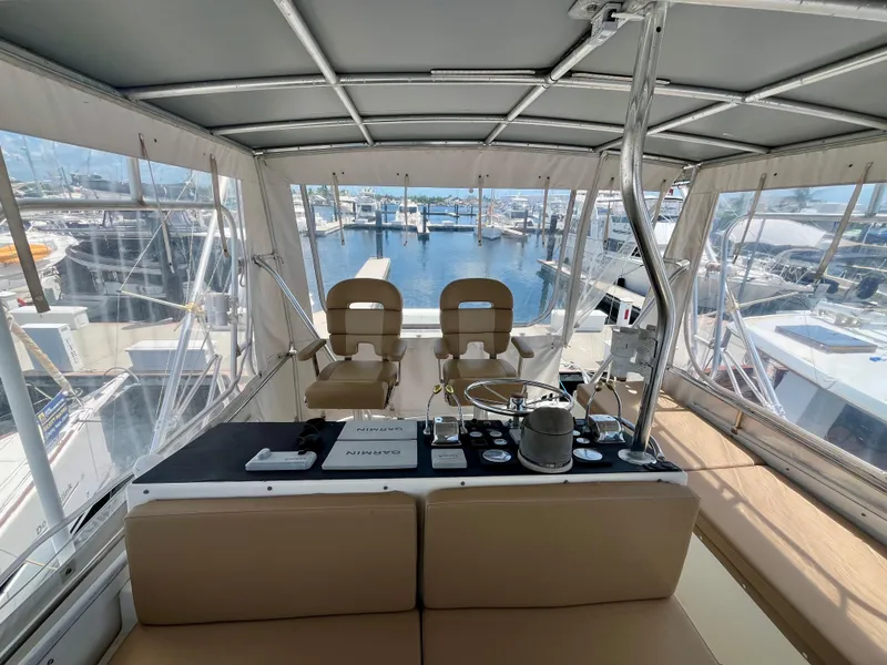 Slide: The Image of Interior view of 1988 Jersey Dawn 40 yacht cockpit with marina background. - 14