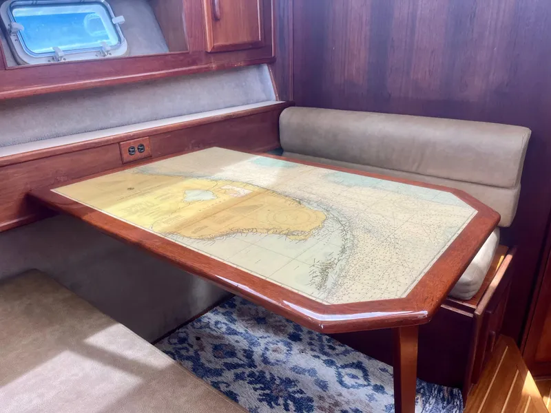 Slide: The Image of Interior of 1988 Jersey Dawn 40 yacht with nautical map table. - 29