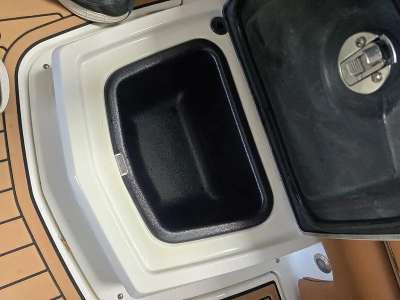 Slide: The Image of Storage compartment in 2019 Nautique Super Air Nautique G25 boat. - 23