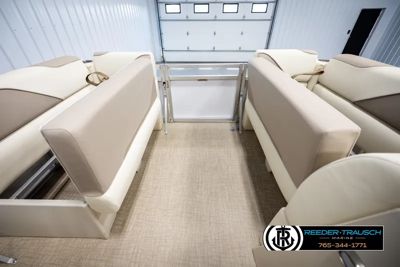 Slide: The Image of 2025 Avalon VEN CRB interior with beige seating in a garage setting. - 19