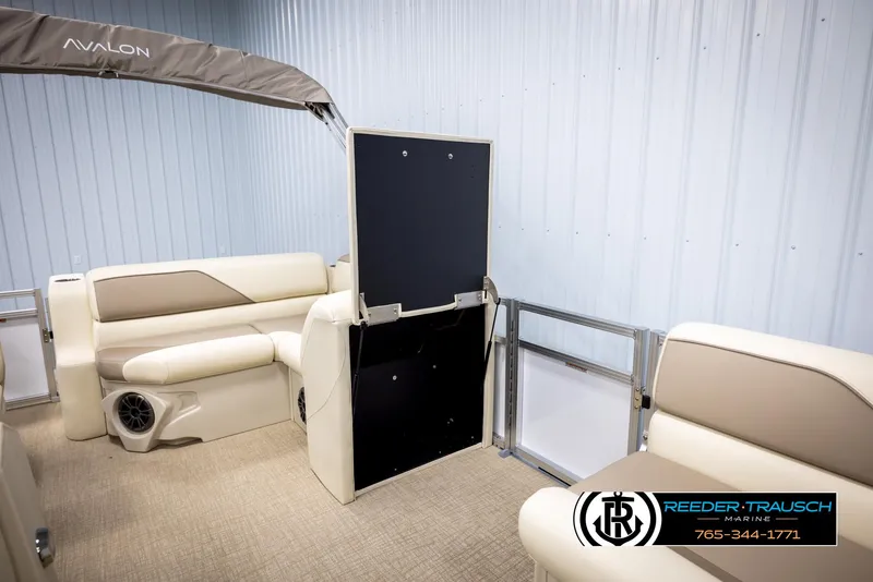 Slide: The Image of 2025 Avalon VEN CRB boat interior with beige seating and modern design. - 21
