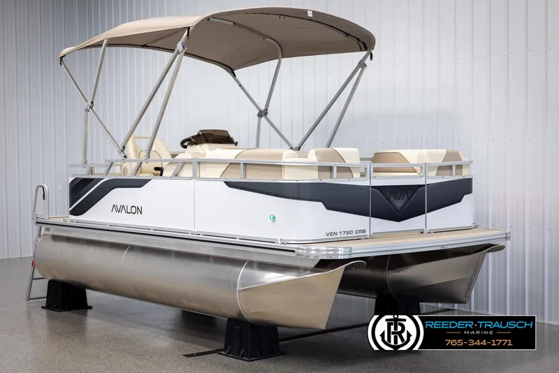 Slide: The Image of 2025 Avalon VEN CRB pontoon boat with canopy in showroom. - 3
