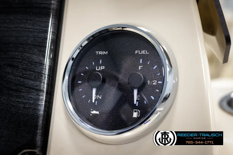 Slide: The Image of 2025 Avalon VEN CRB dashboard gauge showing trim and fuel levels. - 31