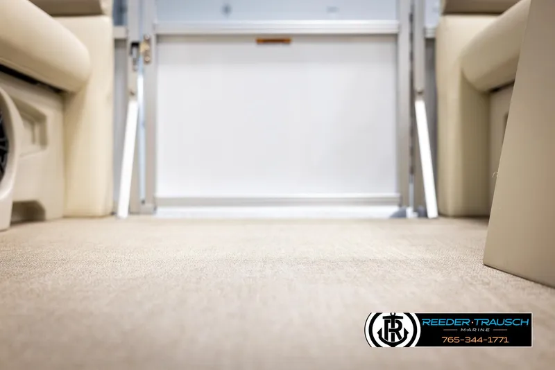 Slide: The Image of 2025 Avalon VEN CRB interior with beige carpet and seating. - 39