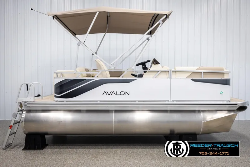 Slide: The Image of 2025 Avalon VEN CRB pontoon boat with canopy and sleek design. - 5