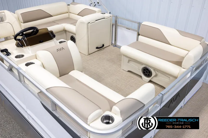 Slide: The Image of 2025 Avalon VEN CRB pontoon boat interior with beige seating and modern design. - 9