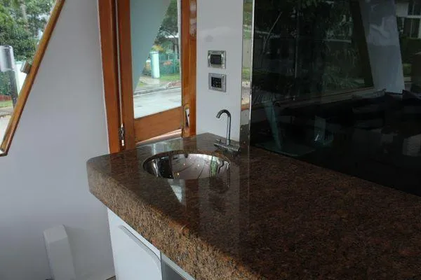 Slide: The Image of Luxurious kitchen area in 1983 Cheoy Lee 90 cockpit motor yacht with granite countertop. - 30