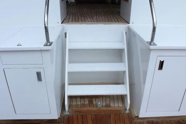 Slide: The Image of Steps leading to deck on 1983 Cheoy Lee 90 cockpit motor yacht. - 32