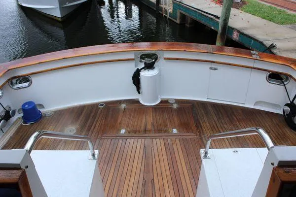 Slide: The Image of 1983 Cheoy Lee 90 cockpit motor yacht with teak deck and mooring equipment. - 36