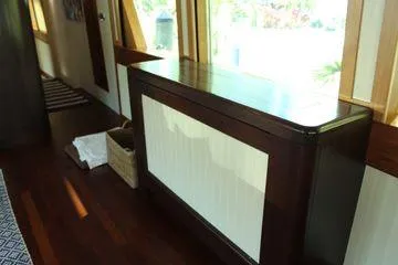 Slide: The Image of Interior of 1983 Cheoy Lee 90 cockpit motor yacht with wooden cabinetry. - 43