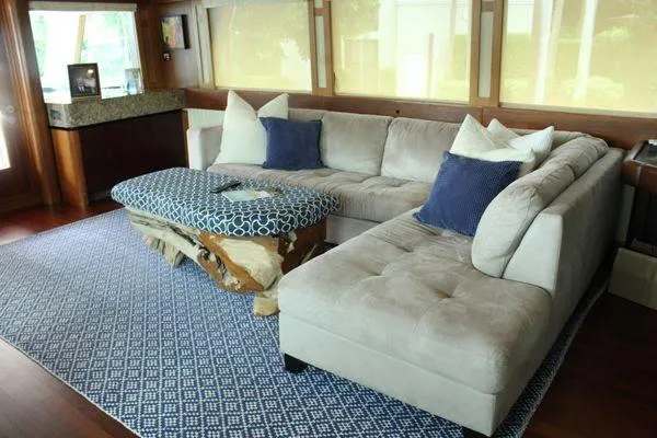 Slide: The Image of Luxurious interior of 1983 Cheoy Lee 90 cockpit motor yacht with plush seating. - 44