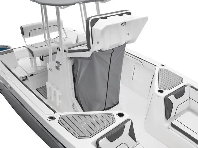 Slide: The Image of 2025 Yamaha Boats 222 FSH Sport interior with seating and storage features. - 5