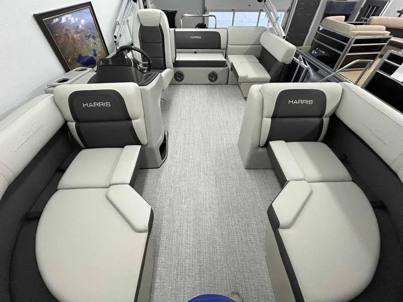 Slide: The Image of 2024 Harris Cruiser 190 interior with spacious seating and modern design. - 10