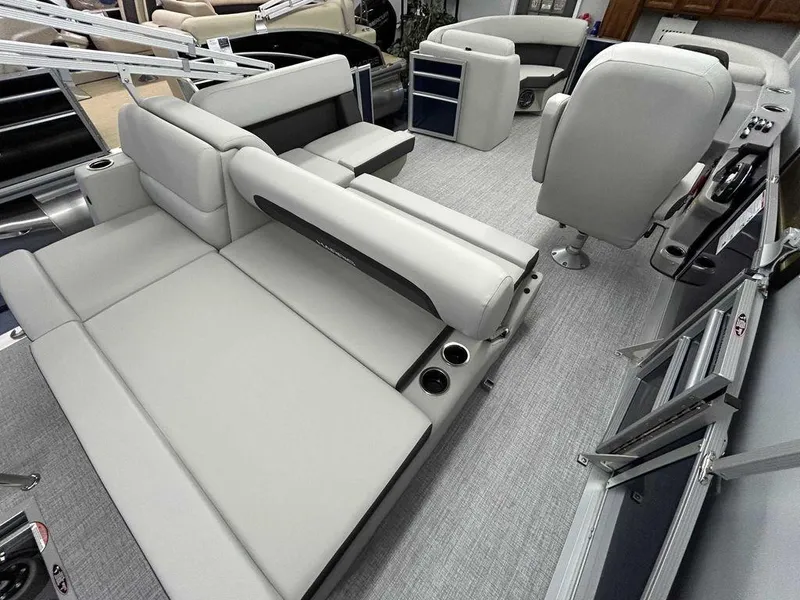 Slide: The Image of 2024 Harris Cruiser 190 interior with plush seating and modern design. - 12