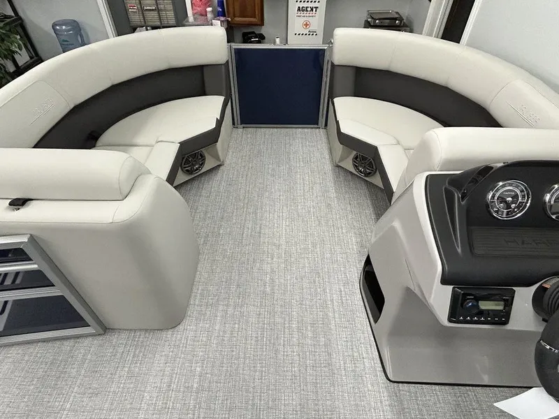 Slide: The Image of 2024 Harris Cruiser 190 interior with plush seating and modern dashboard. - 3