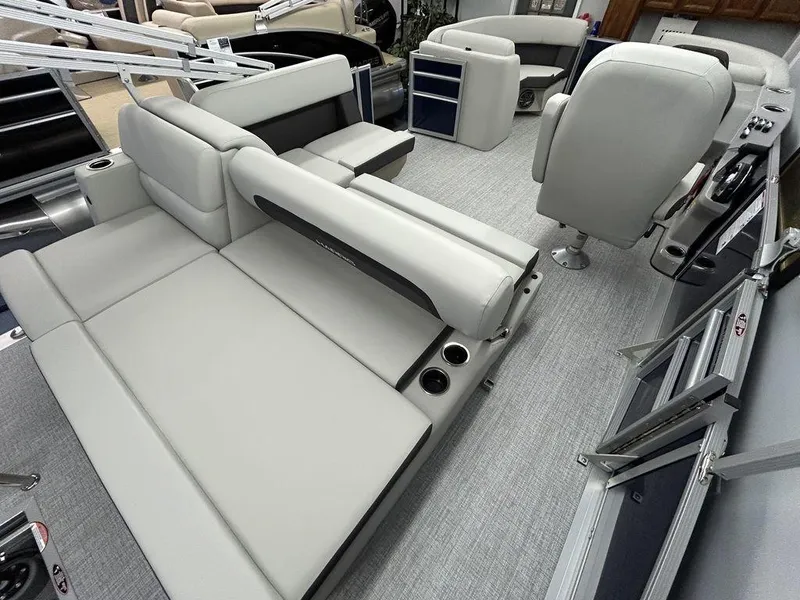 Slide: The Image of 2024 Harris Cruiser 190 interior with plush seating and modern design. - 7