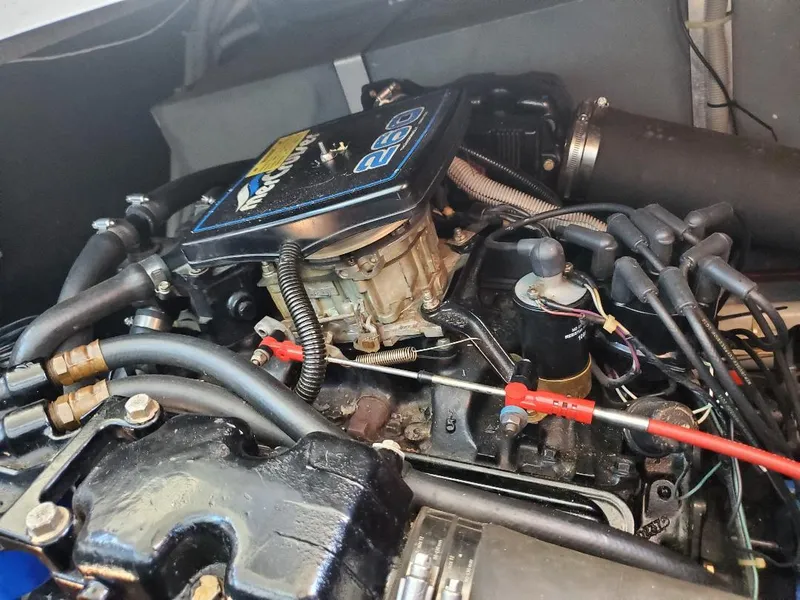 Slide: The Image of Engine of 1987 Sea Ray 340 Express Cruiser with detailed components and wiring. - 24