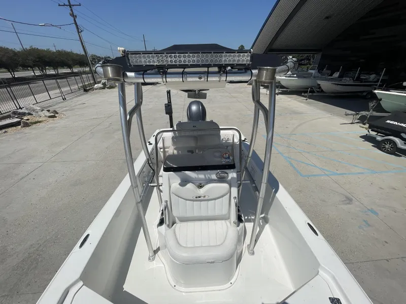 Slide: The Image of 2014 Sea Hunt Bay Boat BX 22 Pro, view of helm and seating area. - 27