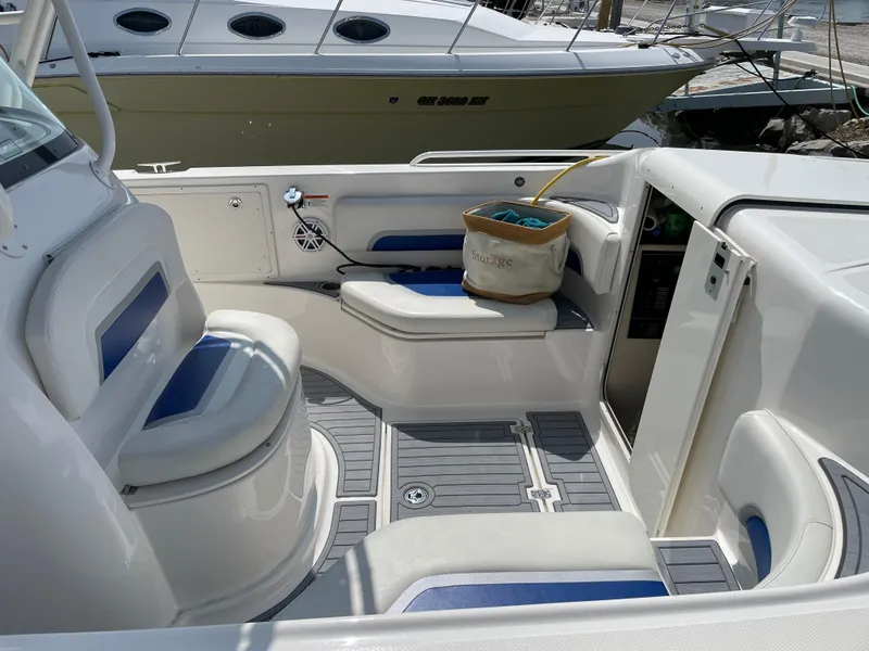 Slide: The Image of Interior of 2015 Wellcraft 35 Scarab boat with seating and storage. - 10