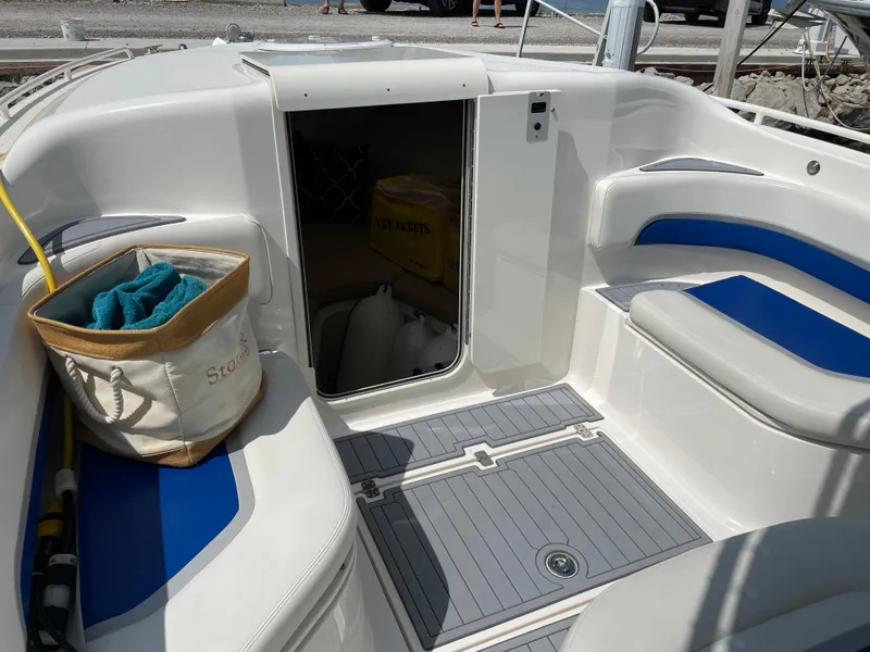 Slide: The Image of 2015 Wellcraft 35 Scarab boat interior with seating and storage area. - 31