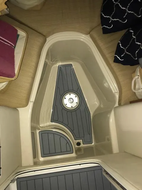 Slide: The Image of Interior view of 2015 Wellcraft 35 Scarab boat, featuring sleek flooring and seating area. - 47