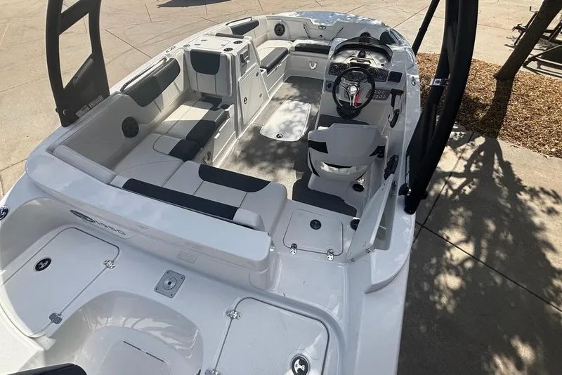 Slide: The Image of 2024 Tahoe 1950 boat interior with sleek seating and modern dashboard design. - 7