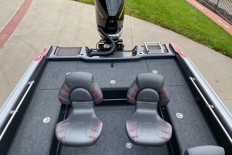 Slide: The Image of 2024 Nitro ZV20 Pro boat interior with dual seats and motor. - 5