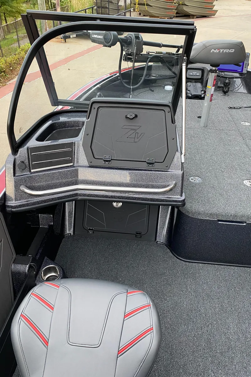 Slide: The Image of 2024 Nitro ZV20 Pro boat interior with sleek seating and modern dashboard design. - 6