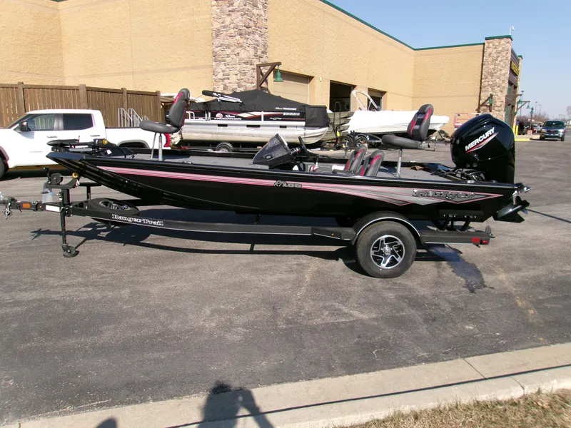Slide: The Image of 2024 Ranger RT188 boat on trailer in parking lot, side view. - 3