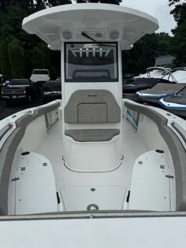 Slide: The Image of 2025 Sea Pro 242 Center Console boat with spacious seating and modern design. - 5