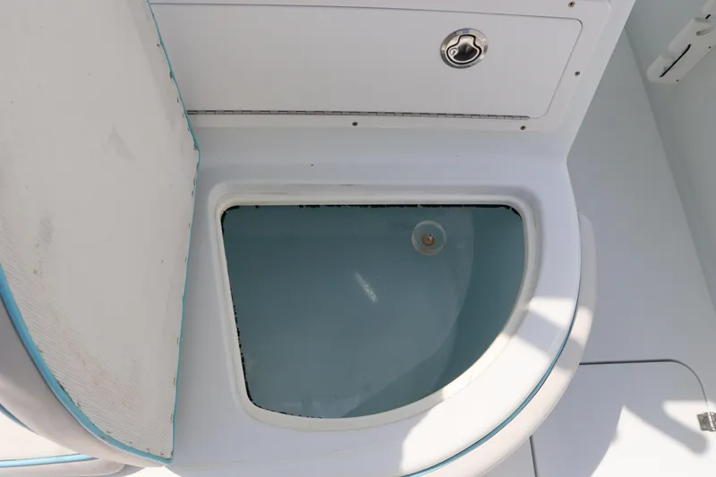 Slide: The Image of Livewell on 2018 Yellowfin 36 Offshore boat, open lid, white interior. - 18