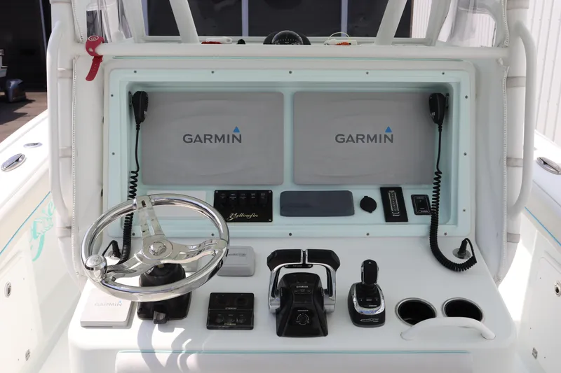 Slide: The Image of 2018 Yellowfin 36 Offshore boat dashboard with Garmin navigation system. - 21