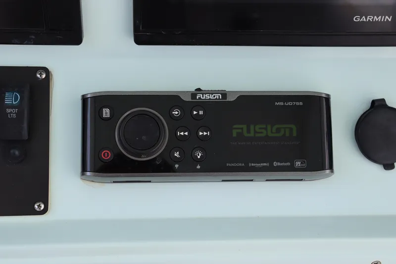 Slide: The Image of Fusion marine stereo system on 2018 Yellowfin 36 Offshore boat dashboard. - 25