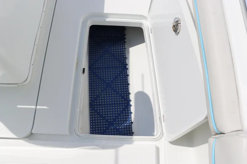 Slide: The Image of Open storage compartment on 2018 Yellowfin 36 Offshore boat. - 31
