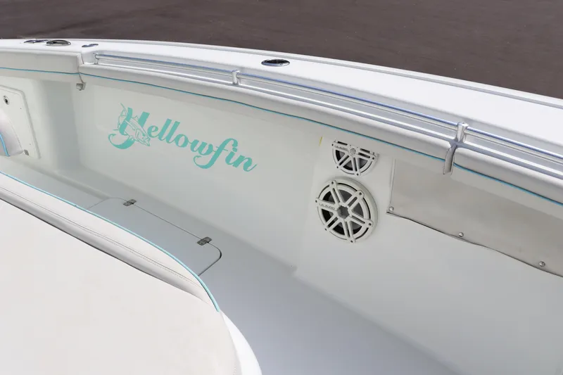 Slide: The Image of 2018 Yellowfin 36 Offshore boat interior with speakers and logo. - 33