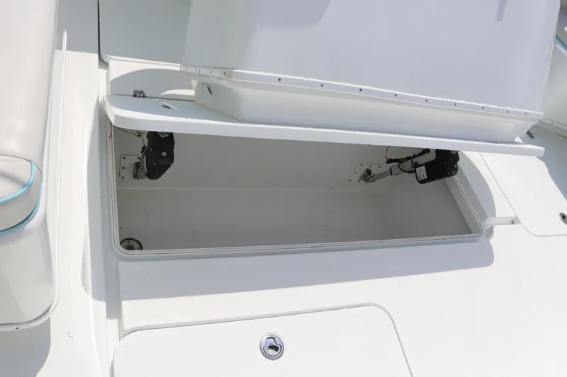 Slide: The Image of 2018 Yellowfin 36 Offshore boat storage compartment, open and empty. - 37