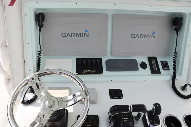 Slide: The Image of 2018 Yellowfin 36 Offshore helm with Garmin displays and controls. - 40