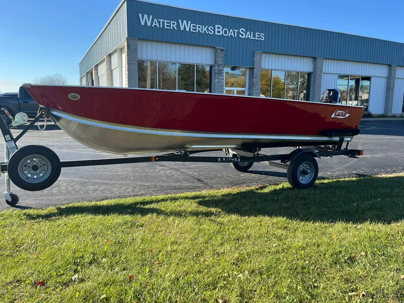 Slide: The Image of 2025 Lund 1600 Fury Tiller boat on trailer at Water Werks Boat Sales. - 1
