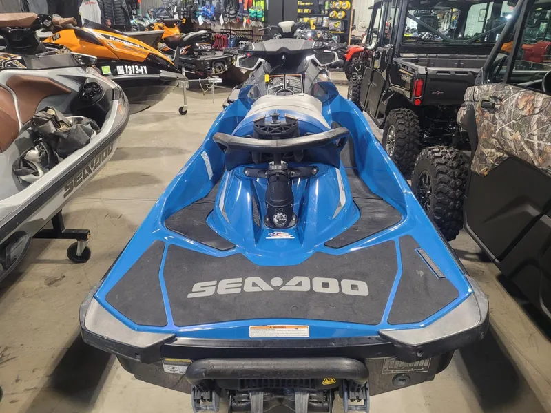 Slide: The Image of 2019 Sea-Doo GTI SE 155 jet ski in showroom, blue color, front view. - 3