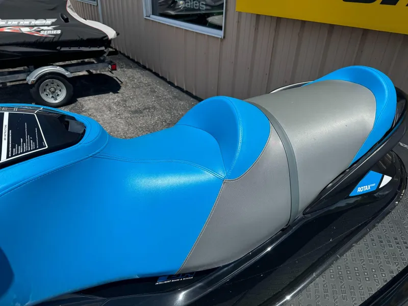 Slide: The Image of 2017 Sea-Doo RXT 260 jet ski with blue and gray seat. - 4