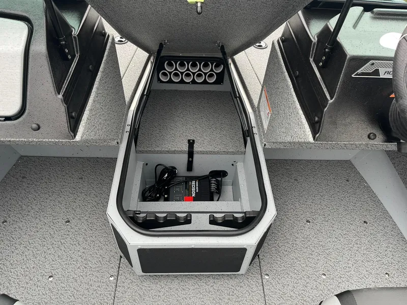 Slide: The Image of 2025 Lund 1775 Adventure Sport boat storage compartment with organized interior layout. - 14