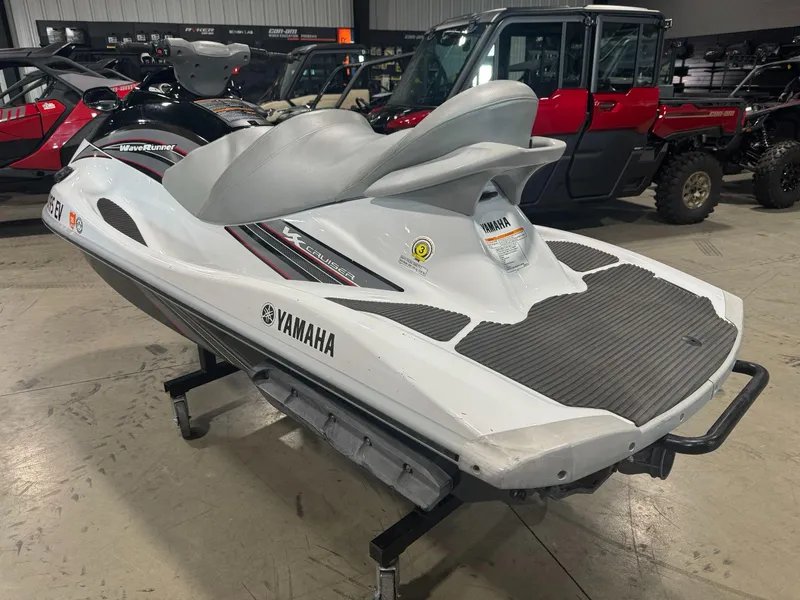 Slide: The Image of 2010 Yamaha WaveRunner VX Cruiser in showroom, white and gray design. - 4