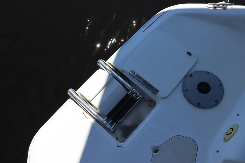 Slide: The Image of 2005 Hurricane FunDeck GS 201 OB boat deck with ladder and mount. - 17