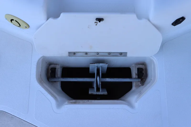 Slide: The Image of Anchor storage compartment on 2005 Hurricane FunDeck GS 201 OB boat. - 18