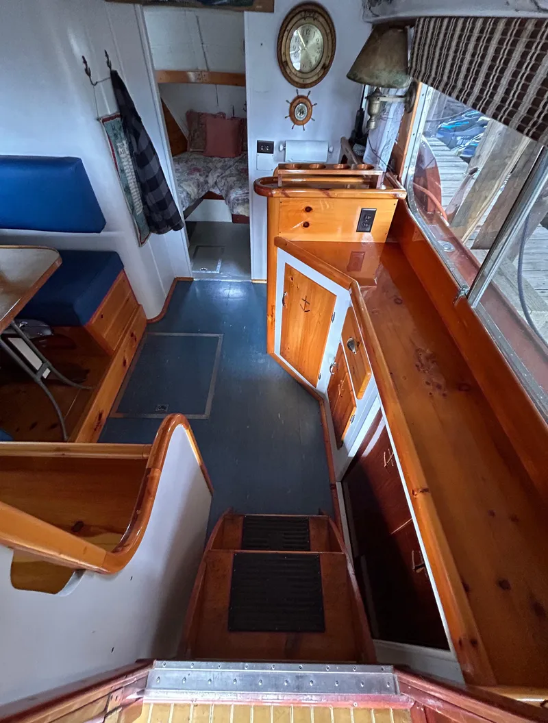 Slide: The Image of Interior of 1954 Chris-Craft Commander 336 Express Cruiser with wood finishes and nautical decor. - 39