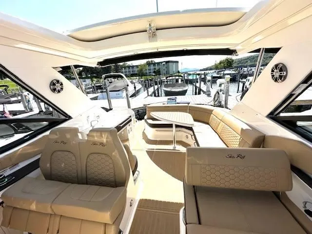 Slide: The Image of Luxurious 2024 Sea Ray 320DA yacht interior with plush seating and modern design. - 29