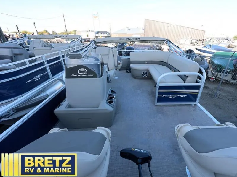 Slide: The Image of 2025 BASS BUGGY 18 DLX pontoon boat interior at Bretz RV & Marine dealership. - 5
